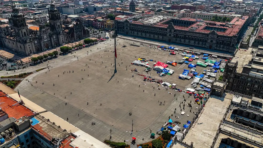 The Zócalo seen from above, with the cathedral on the north side and the flag in the centre